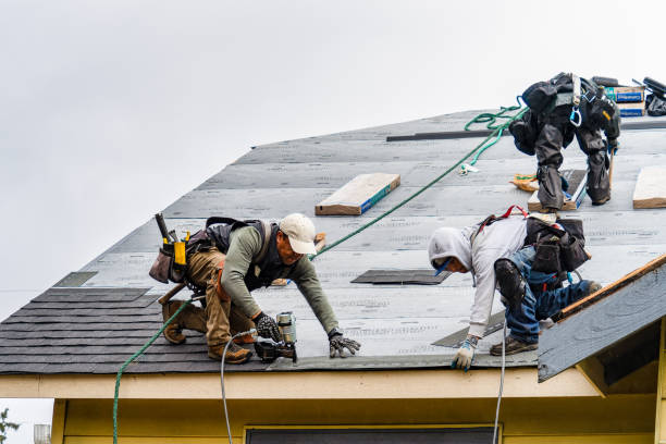 Professional Gutter Installation technician working in Washington, NH